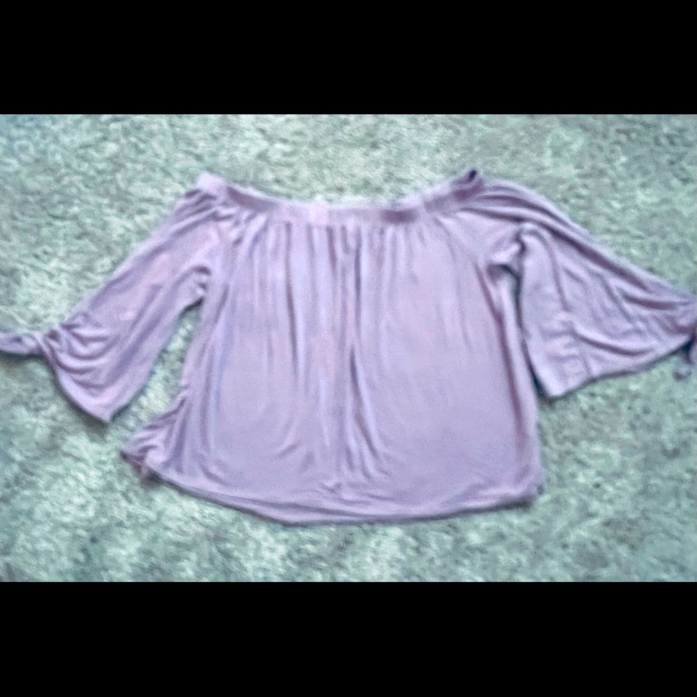 Lavender off the shoulder crop top with ties on bottom of sleeves.